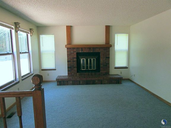 Bright family room with windows facing the back yard