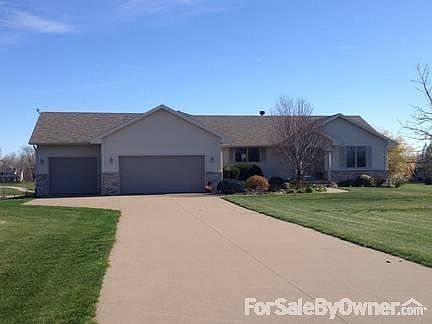 Front View
						:
						Landscaped yard provides excellent curb appeal for this wonderful ranch