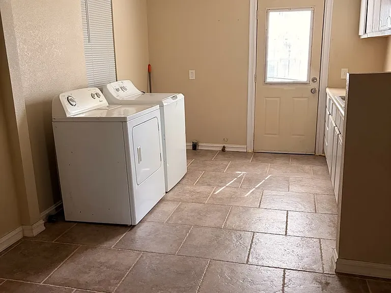 Inside laundry with washer and dryer