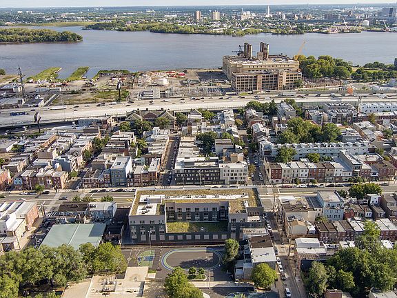 Explore the charm of riverside urban living with scenic views and modern amenities.