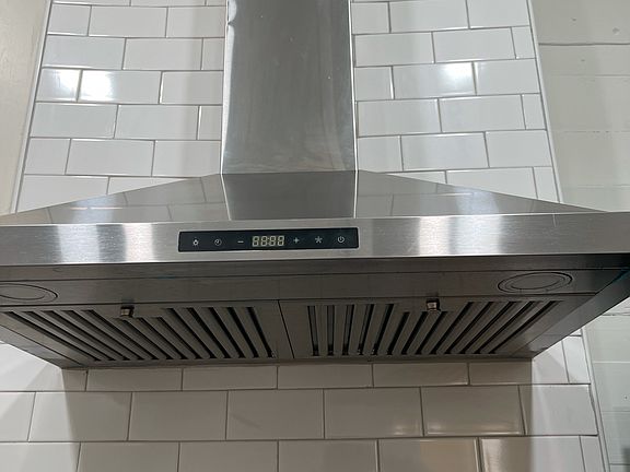 Subway tile wall Hood