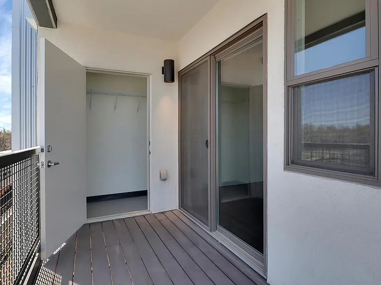Top Floor "Short Line" floorplan unit 301 has storage on balcony