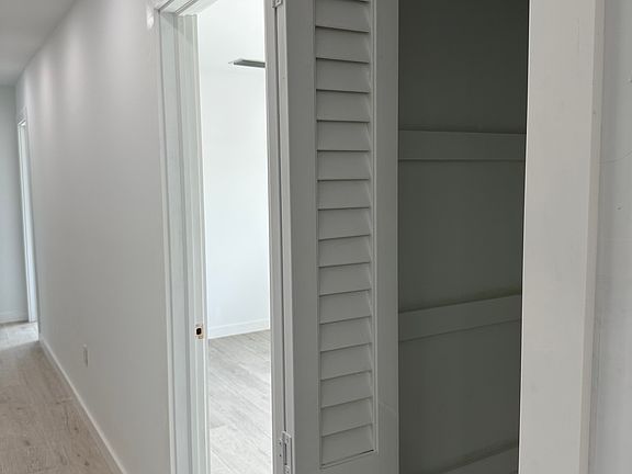 One bedroom in the front and two in the back. Small closet space by the second bathroom
