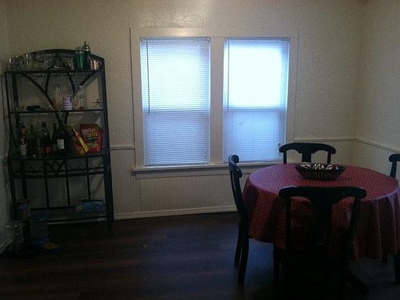 dining room featuring wood floors