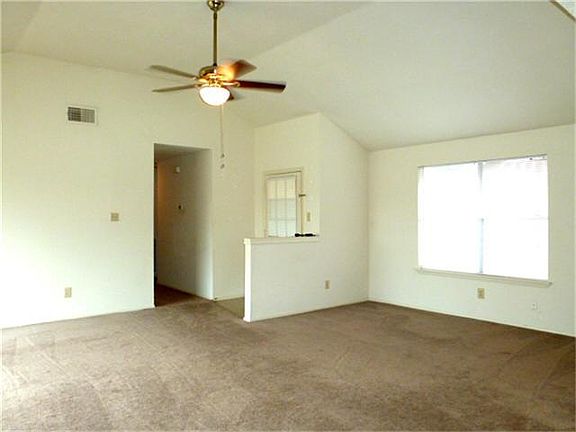 Opposite view of the family room toward the front door.