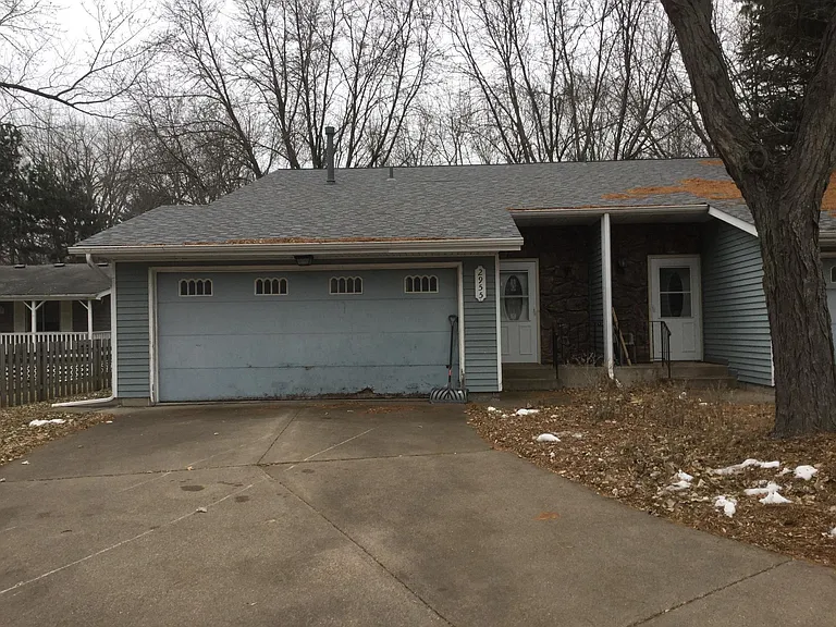 Front of duplex 2 car garage with garage opener provided , real quite neighborhood with all home owners surrounding this side x side 2 bedroom duplex