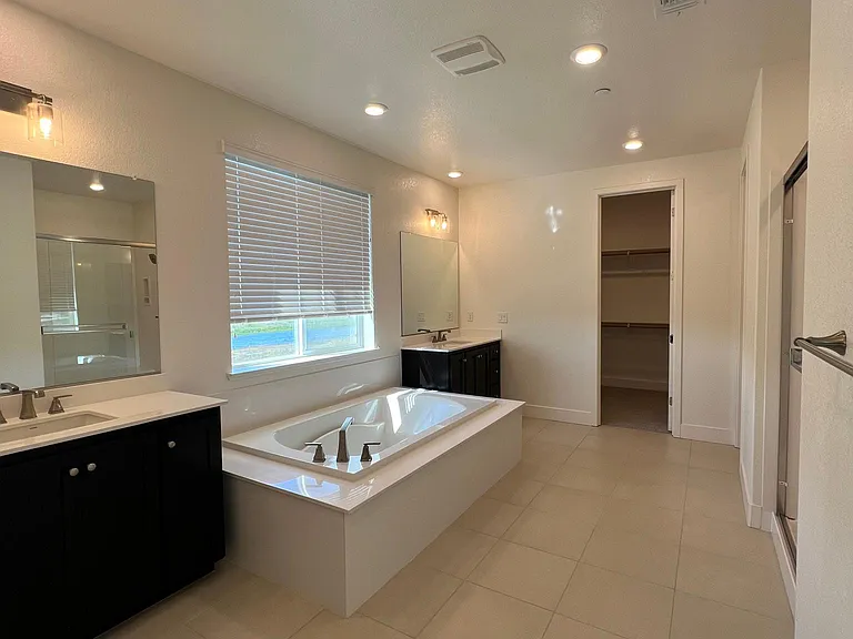 Master bathroom with soaking tub and shower