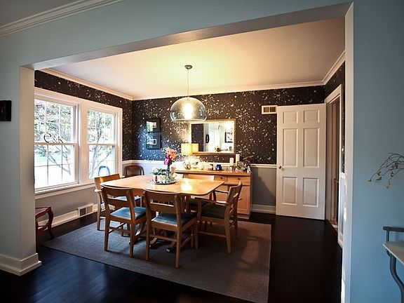 large dining room with loads of SUN!
