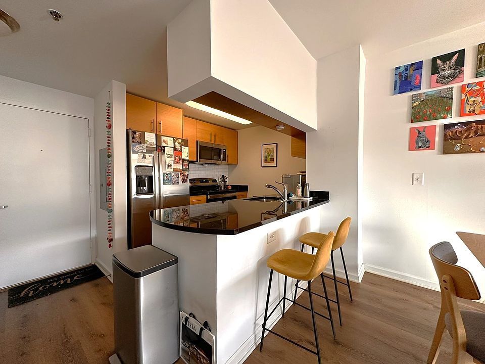 1st image of 102 Christopher Columbus Dr APT 302