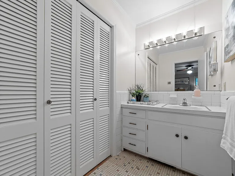 Primary bathroom with large closet.