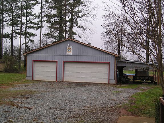 3-car Garage and Carport