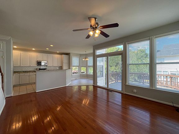 Family room, kitchen, eat in, and deck