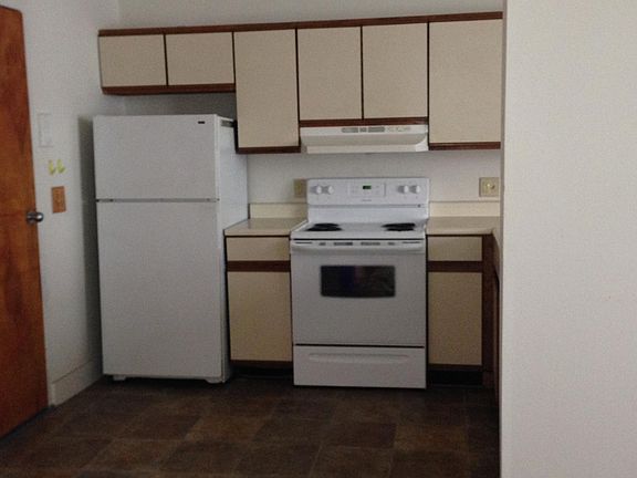 kitchen and entry door on left