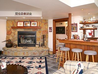 Fireplace & bar in lower level