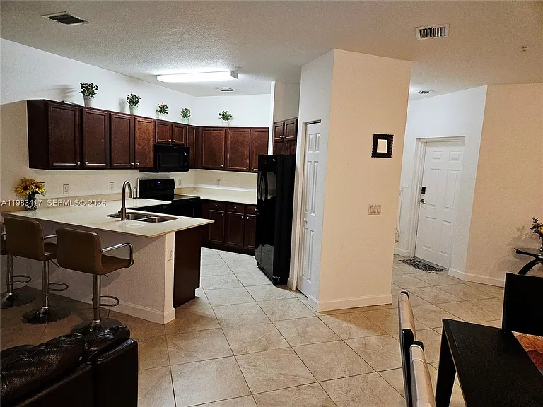 290 NW 109th Ave #107 — Photo 3