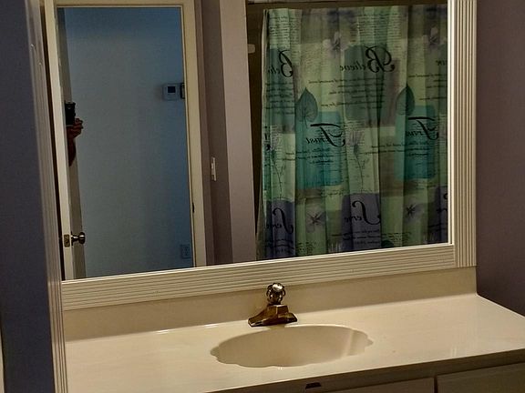 All three baths have new paint, lights and sink fixtures.