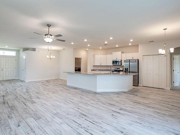 A spacious and open living area welcomes you home - Willow II home plan by Highland Homes