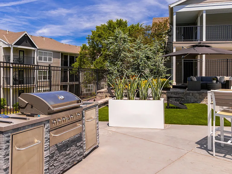 Enjoy outdoor cooking at our poolside grilling station, perfect for hosting barbecues and gatherings. Surrounded by lush greenery and modern seating, it's an ideal spot for relaxation and socializing.