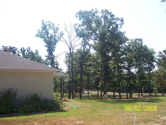 wooded with pond view