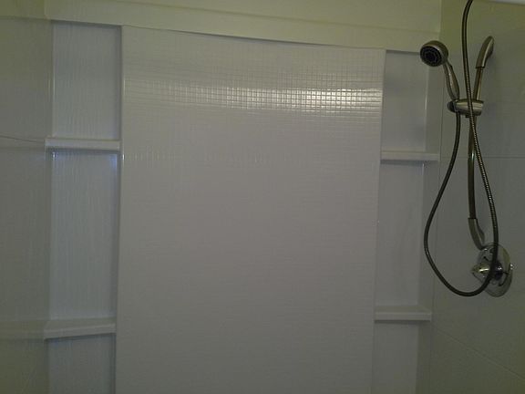newly renovated bathroom with walk in shower