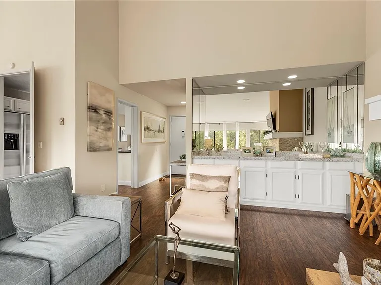 Living room area with queen size sleeper sofa bed.
