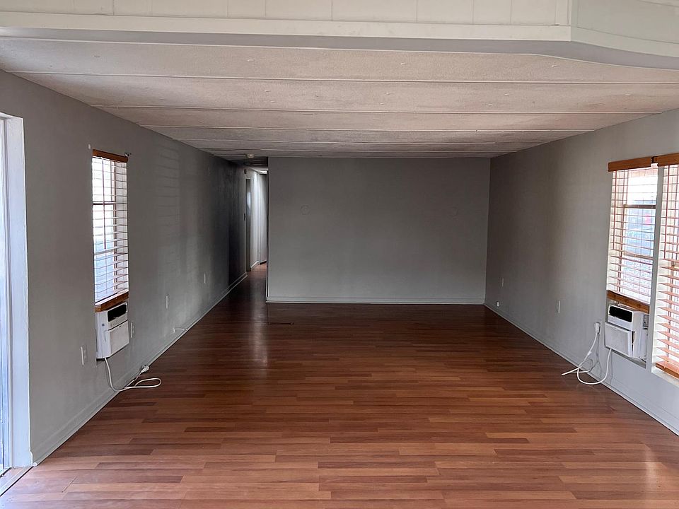 Living Room and Hallway (Kitchen behind camera)