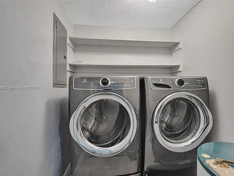 5963 NW 25th Ct #210 — Photo 16