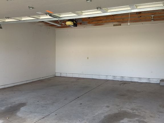 Oversized 2 1/2 attached garage- drywalled