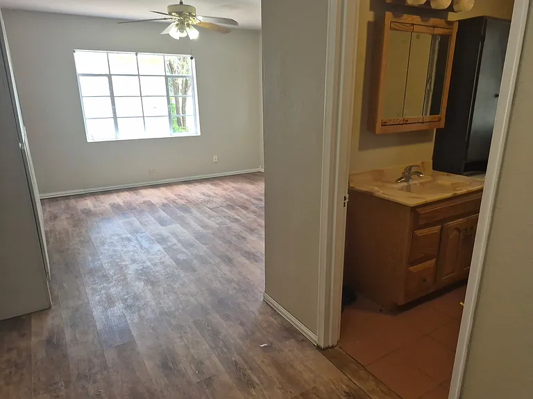 Master bedroom showing part of ensuite bathroom.