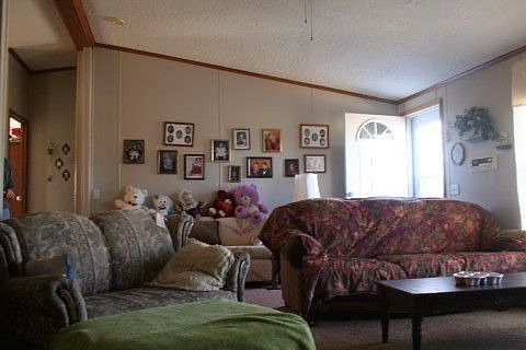 Nice spacious living room. Home has open liv'g/dining/kitch