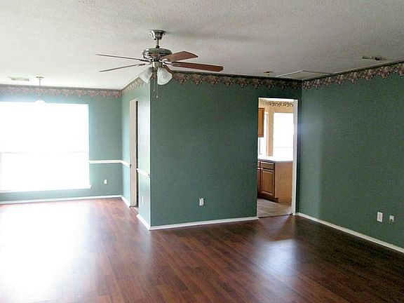 Open Living and Formal Dining Rooms