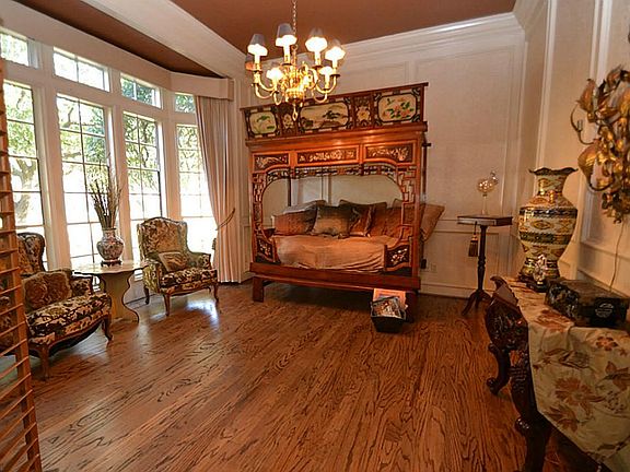 As you enter into the foyer you have a spacious Study featuring wood floors, a bay window, Chandelier and doors that close off this great space.