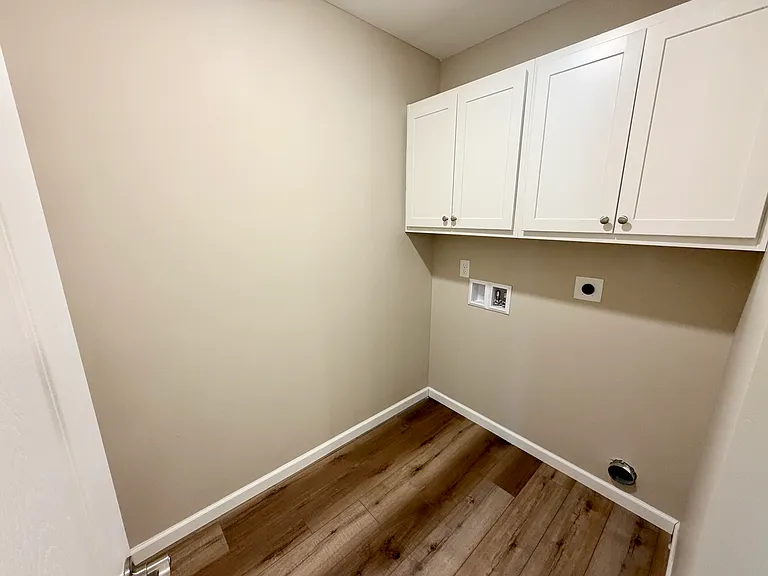 Unit comes with laundry hookups for washer and electric dryer, located in the guest bathroom