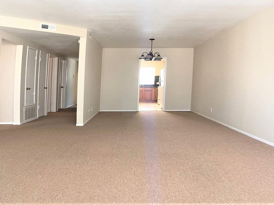 View from living room to dining room and kitchen