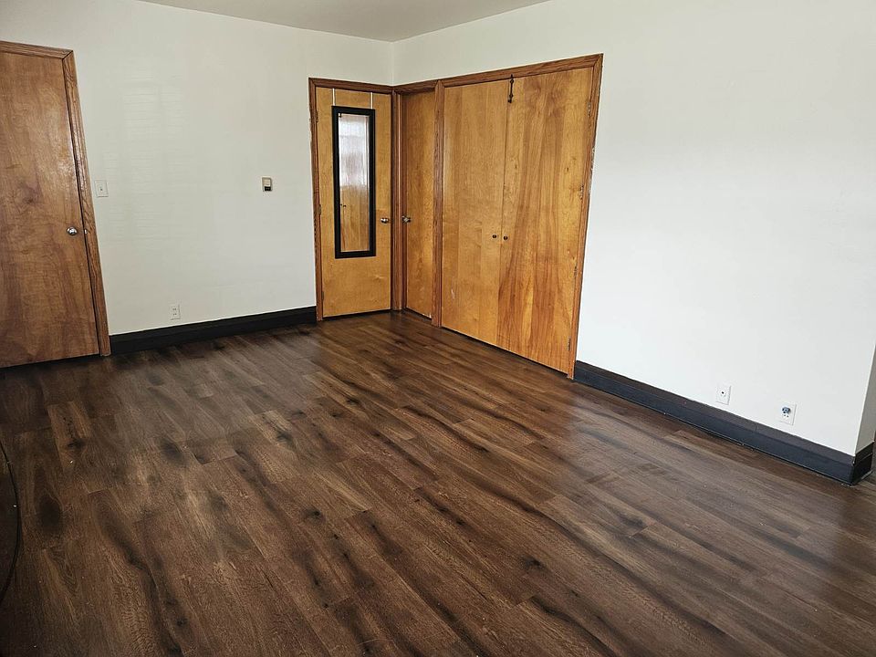 Main room, Murphy Bed closet, Bathroom door and Closet doors