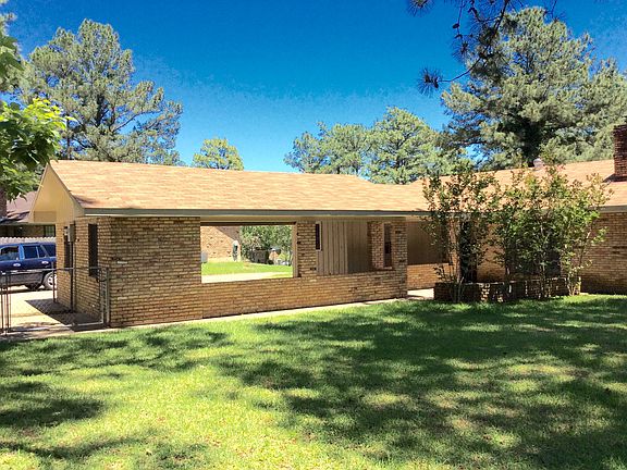 Backyard facing carport