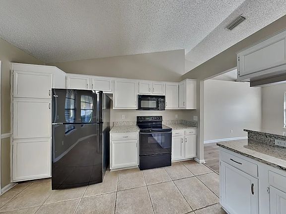 5th image of 8706 Woodcamp Dr