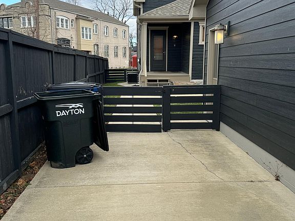 Car pad next to garage for guest parking