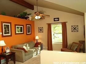 Living Room w/vaulted ceiling and central beam