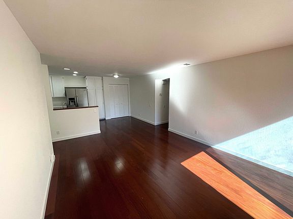 Living room, kitchen, and laundry.