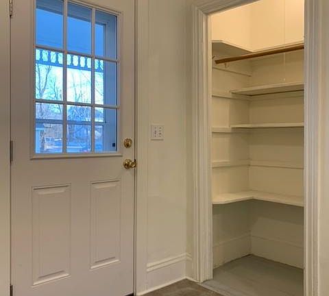 Spacious entryway closet.