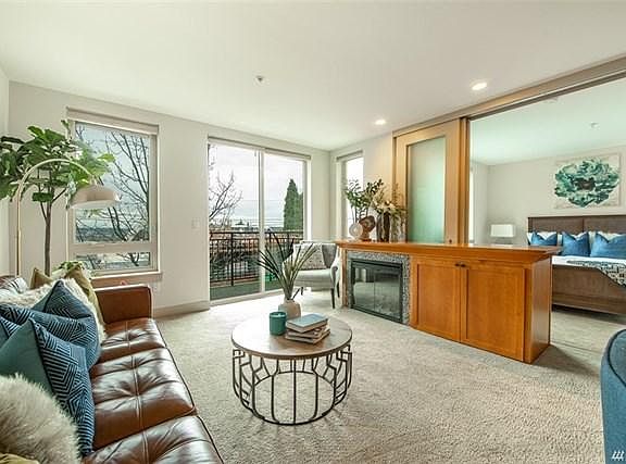 Living Room and into bedroom, with sliding doors open