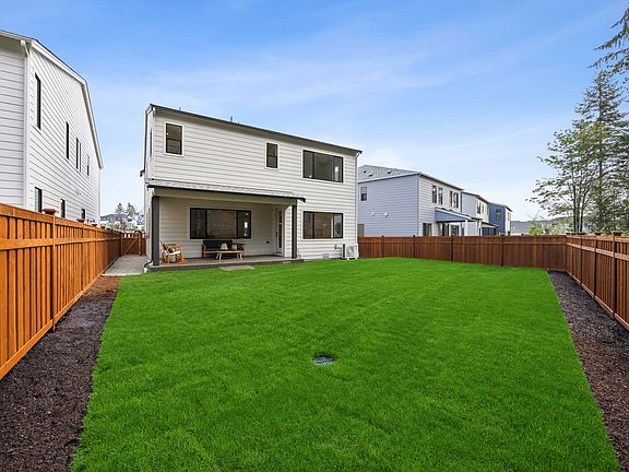 Large Fenced Rear Yard and Covered Outdoor Living