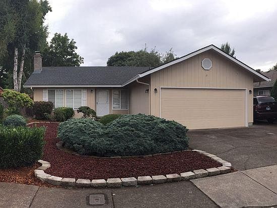 Low maintenance front yard. Room for extra vehicle, small RV, boat next to garage.