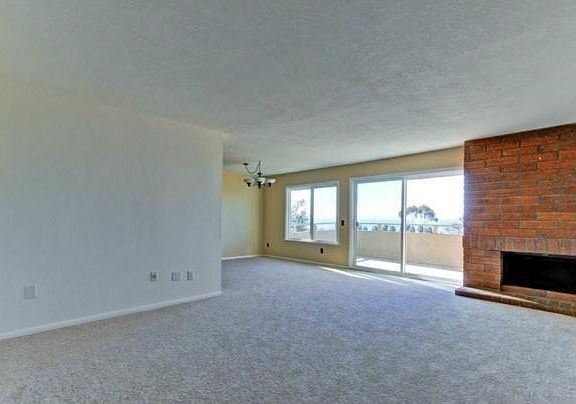 Carpet has been replaced with wood. Must see.