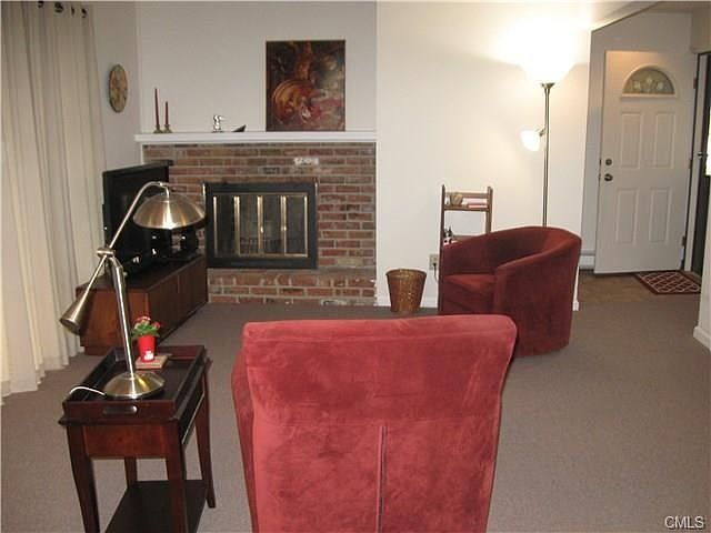 Fireplace in Living Rm, looking toward entry