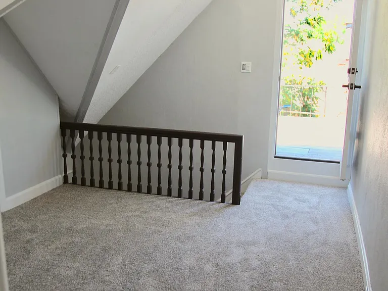 Upstairs living space (looking at rooftop patio)