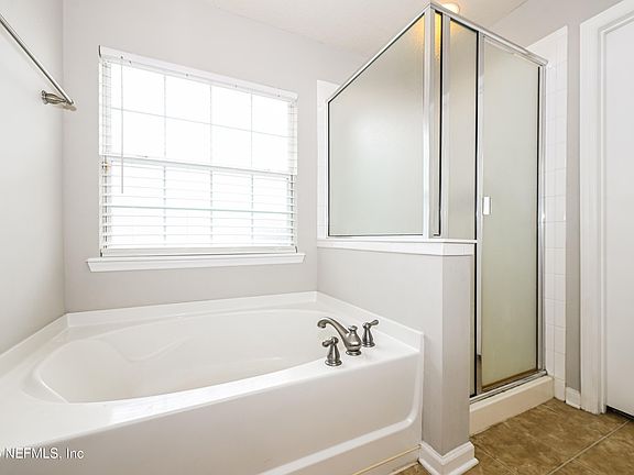 5th image of 11353 JUSTIN OAKS Drive N