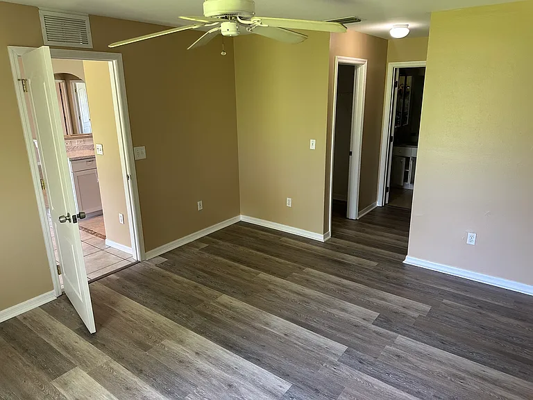 Master bed room with 2 walk in closets