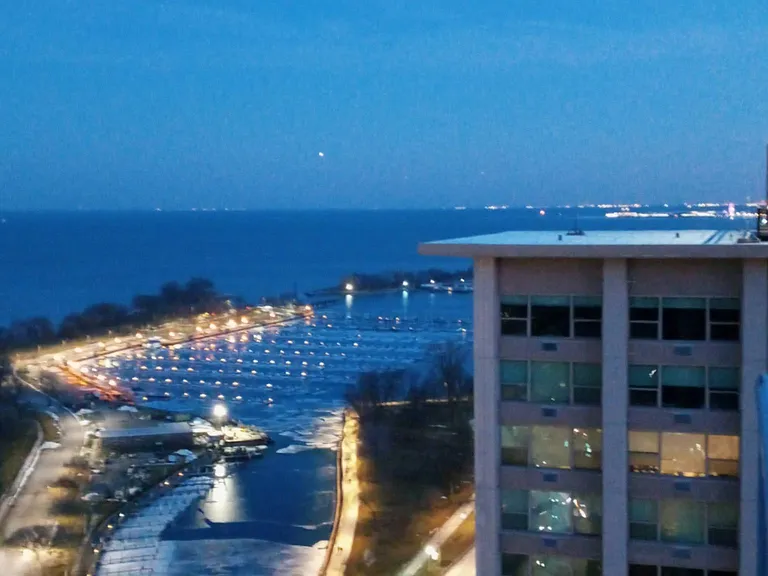 Rooftop view (south) of Belmont Harbor at dusk